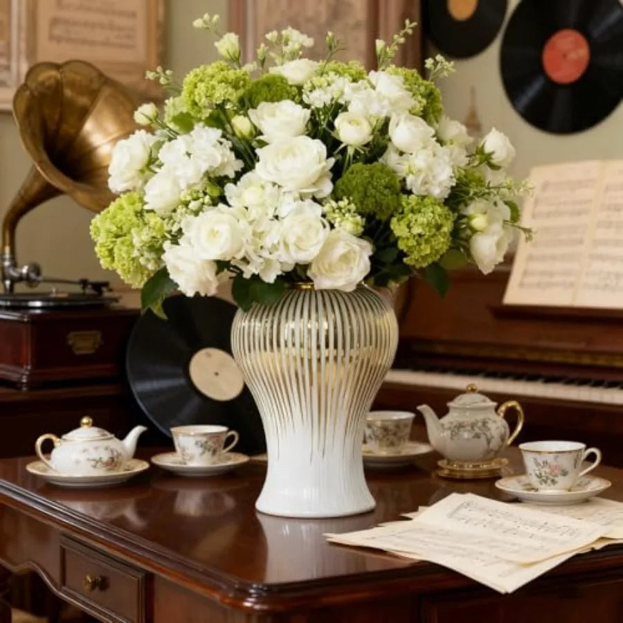 Centerpieces use: white and gold ginger jars vintage-style vase with lid 14 in tall ceramic material white-gold finish elegant